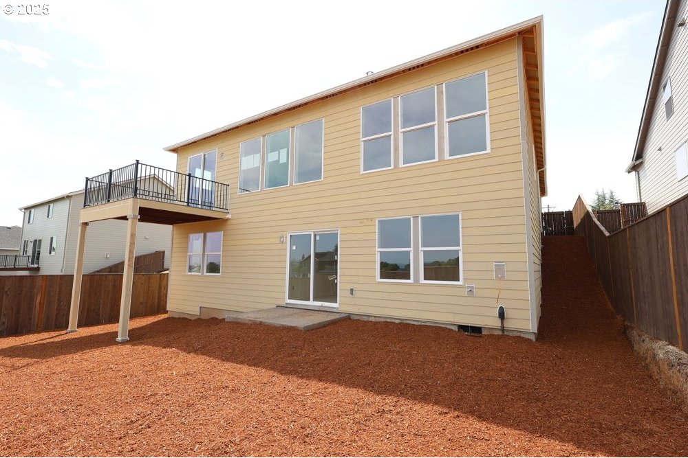 807 Misty Ln, Forest Grove, OR 97116 - back of property with a fenced backyard and a balcony