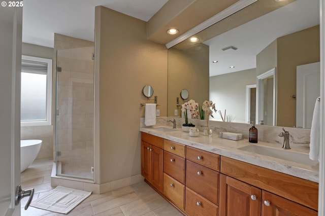 8333 NW Hazeltine St, Portland, OR 97229 - full bath featuring a shower stall, double vanity, a freestanding bath, and tile patterned flooring