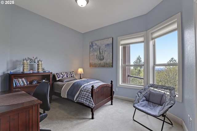 8333 NW Hazeltine St, Portland, OR 97229 - bedroom featuring baseboards and light colored carpet