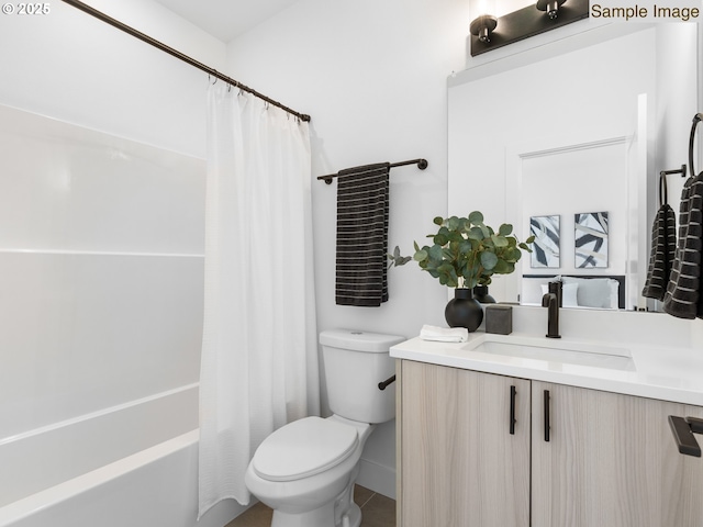 bathroom with toilet, vanity, and shower / tub combo