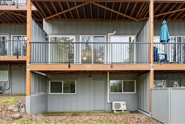 back of property featuring ac unit