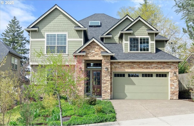 craftsman house featuring stone siding, a shingled roof, a garage, and concrete driveway
