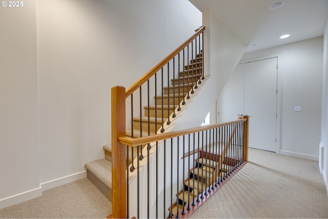 1716 NW Riverscape St, Portland, OR 97209 - stairs with recessed lighting, carpet flooring, and baseboards