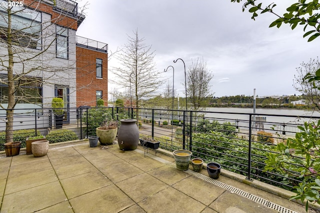 1716 NW Riverscape St, Portland, OR 97209 - view of patio / terrace with a water view and a balcony