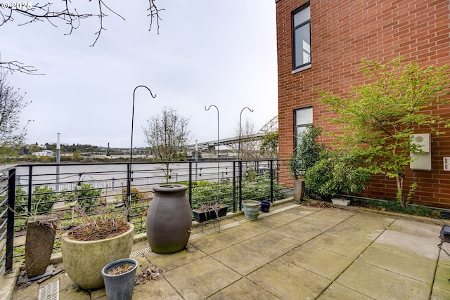 1716 NW Riverscape St, Portland, OR 97209 - view of patio / terrace featuring a water view