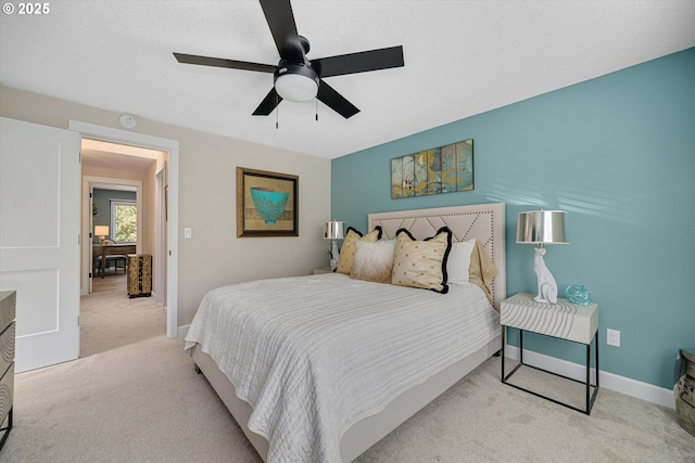 bedroom with baseboards, carpet, and ceiling fan
