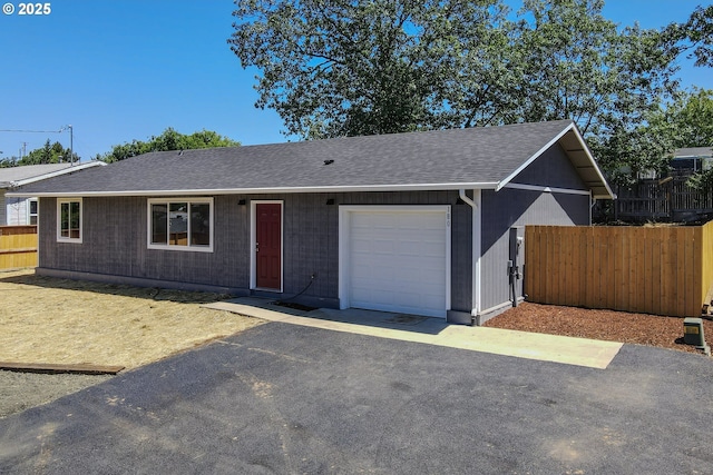 180 SE Darrell Ave, Winston, OR 97496 - ranch-style home with a garage and roof with shingles
