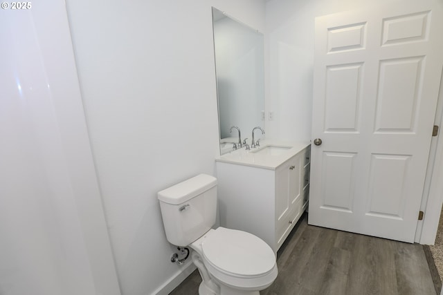 180 SE Darrell Ave, Winston, OR 97496 - bathroom featuring vanity and wood finished floors