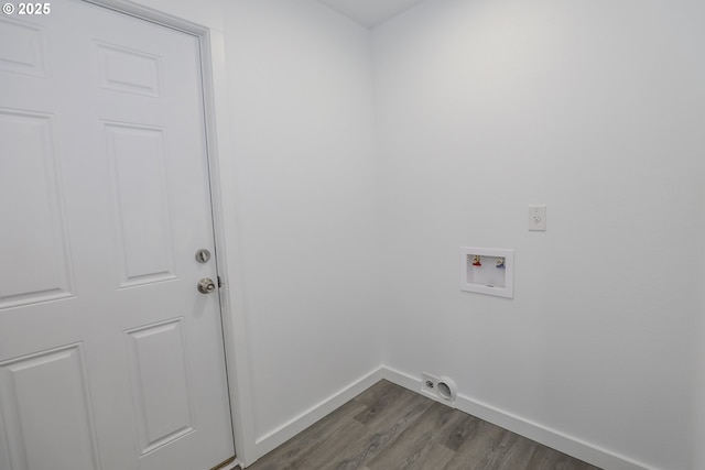 180 SE Darrell Ave, Winston, OR 97496 - washroom with dark wood-style floors and washer hookup