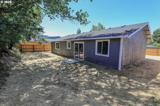 180 SE Darrell Ave, Winston, OR 97496 - rear view of house with a patio area