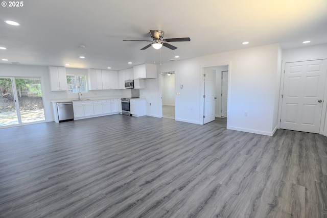 180 SE Darrell Ave, Winston, OR 97496 - unfurnished living room with ceiling fan, recessed lighting, and wood finished floors