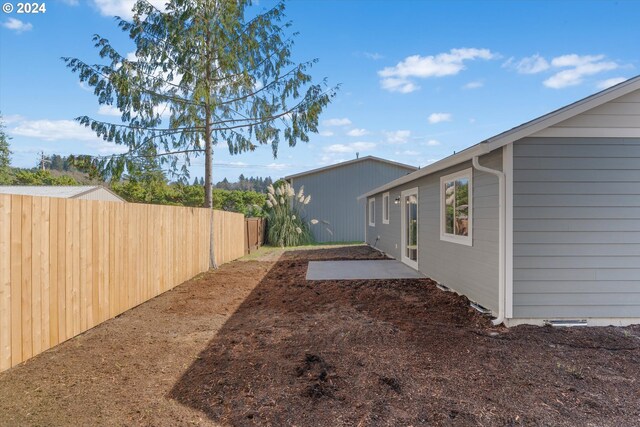 11480 Fern Way, Nehalem, OR 97131 - view of yard with a patio