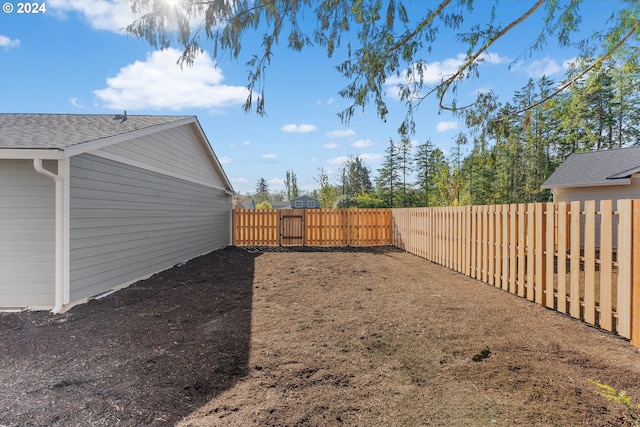11480 Fern Way, Nehalem, OR 97131 - fenced backyard featuring a gate