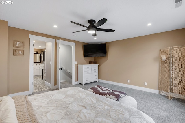 carpeted bedroom with baseboards, visible vents, a ceiling fan, ensuite bathroom, and recessed lighting