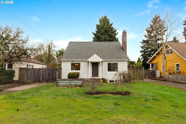 view of front facade with central air condition unit, a front lawn, fence, a shingled roof, and a chimney