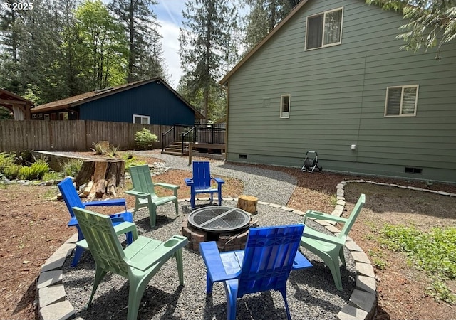 65121 E Lupine Dr, Rhododendron, OR 97049 - view of patio / terrace with an outdoor fire pit and a deck