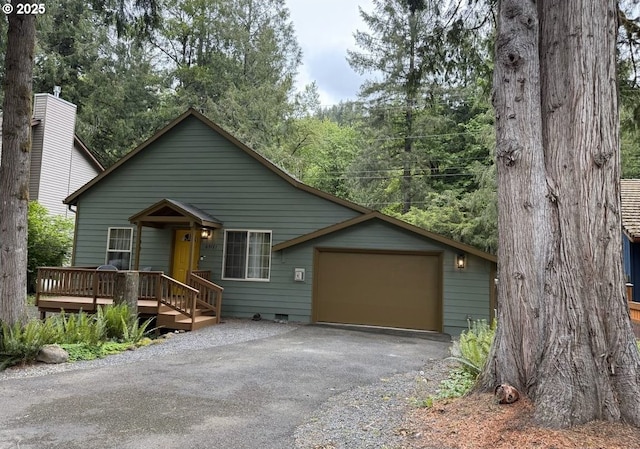 65121 E Lupine Dr, Rhododendron, OR 97049 - view of front of house featuring driveway and an attached garage