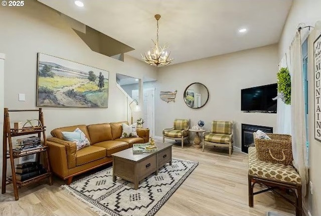 65121 E Lupine Dr, Rhododendron, OR 97049 - living room featuring a chandelier, light wood-style flooring, recessed lighting, and baseboards