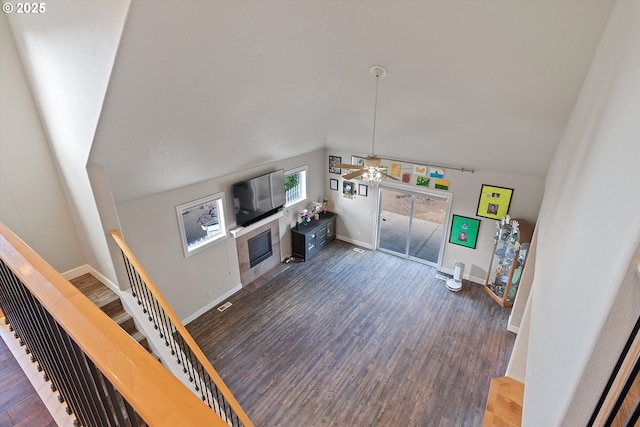 5779 NE Voyage Way, Lincoln City, OR 97367 - living room with vaulted ceiling, ceiling fan, and dark hardwood / wood-style floors