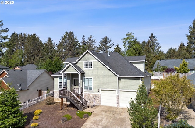 5779 NE Voyage Way, Lincoln City, OR 97367 - view of front of house featuring a garage