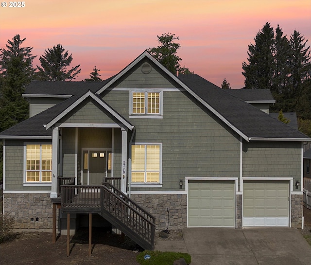5779 NE Voyage Way, Lincoln City, OR 97367 - view of front of home with covered porch and a garage