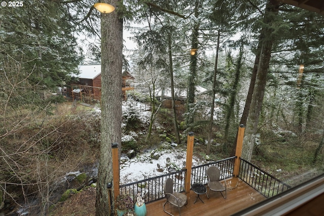 view of snow covered deck