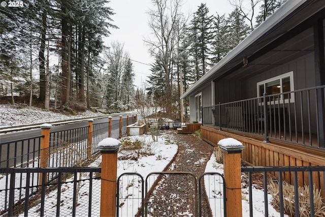 view of yard covered in snow