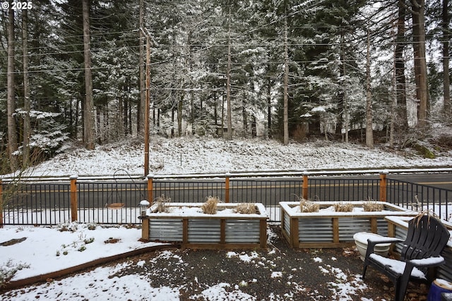 view of snow covered deck