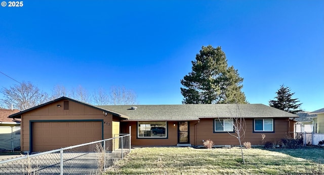 ranch-style house with a front lawn and a garage