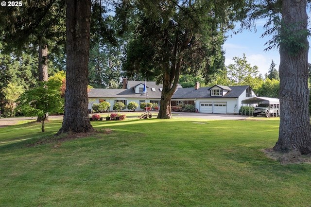 840 Springhill Dr, Albany, OR 97321 - new england style home featuring a front yard, a detached carport, a garage, and a chimney