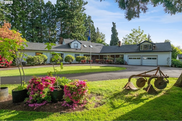 840 Springhill Dr, Albany, OR 97321 - view of front of home featuring asphalt driveway, an attached garage, and a front lawn