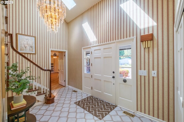 840 Springhill Dr, Albany, OR 97321 - foyer entrance featuring stairs, a chandelier, and wallpapered walls