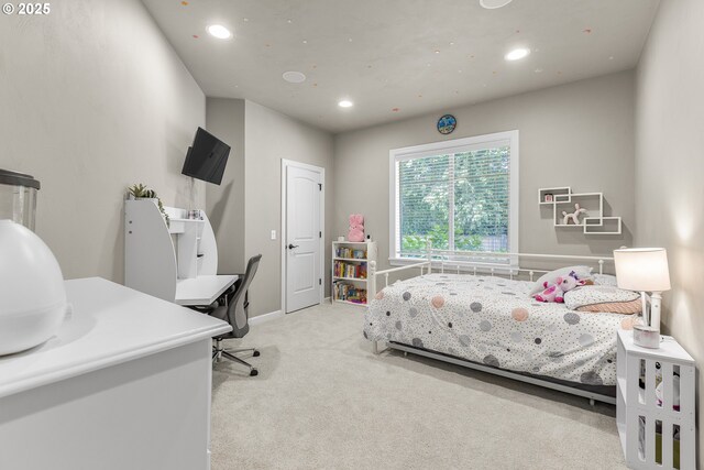 carpeted bedroom featuring recessed lighting and baseboards