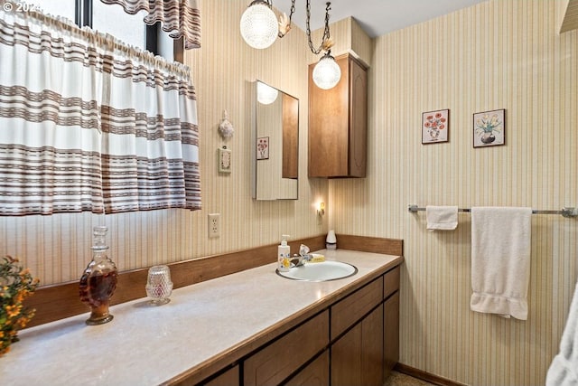 8050 SW 103rd Ave, Beaverton, OR 97008 - bathroom featuring wallpapered walls and vanity