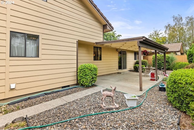 8050 SW 103rd Ave, Beaverton, OR 97008 - rear view of house with a patio area