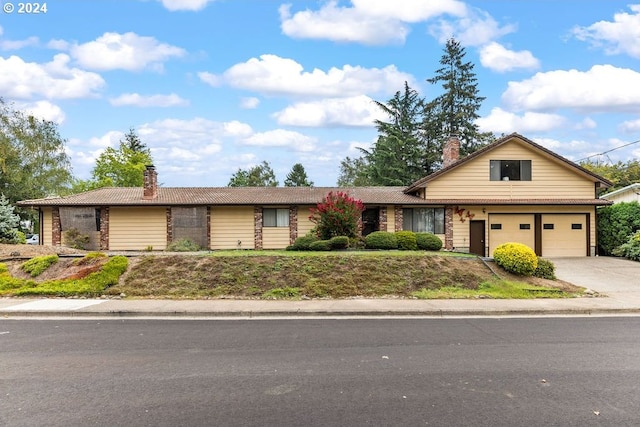 8050 SW 103rd Ave, Beaverton, OR 97008 - ranch-style house featuring a chimney, driveway, a garage, and a tile roof