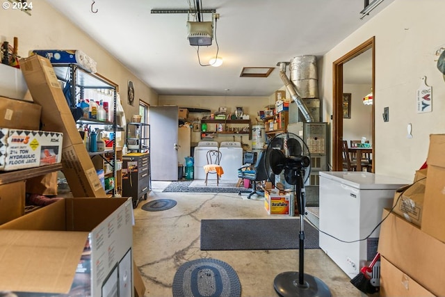 8050 SW 103rd Ave, Beaverton, OR 97008 - garage with a garage door opener, washing machine and dryer, and refrigerator