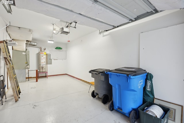 garage with a garage door opener and secured water heater