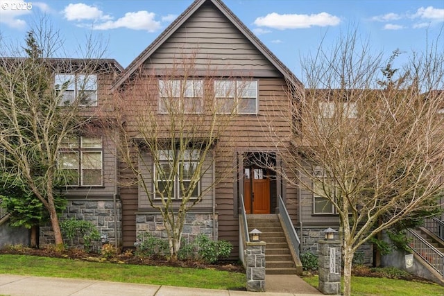 view of front of home featuring stone siding