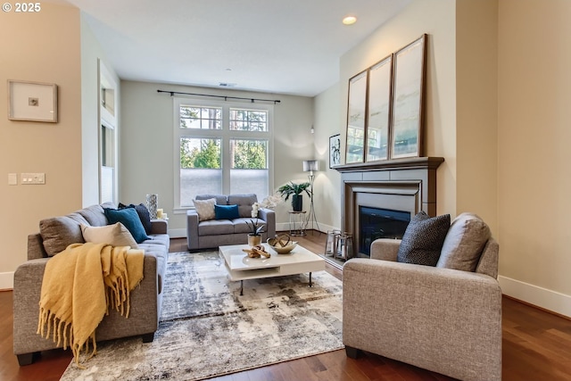 living room featuring dark hardwood / wood-style floors