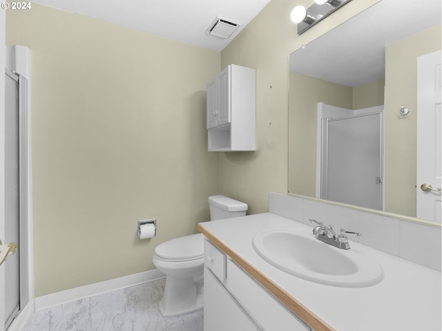 bathroom featuring marble finish floor, visible vents, toilet, a stall shower, and baseboards