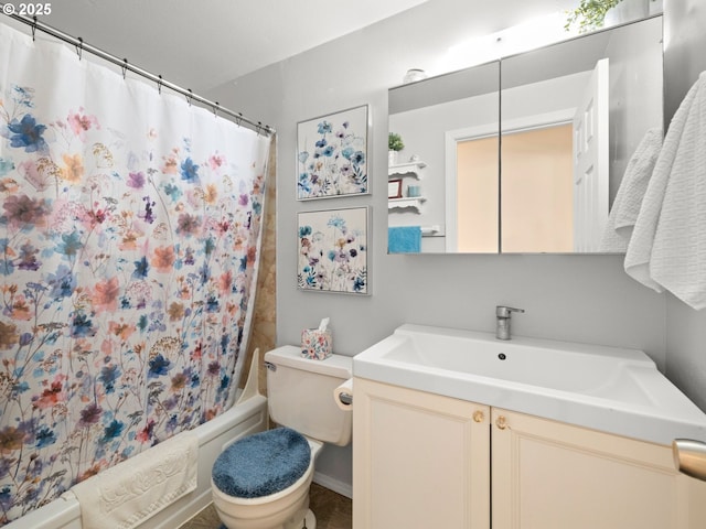 bathroom featuring shower / bath combo with shower curtain, toilet, and vanity