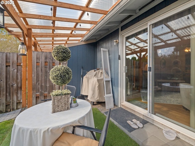 view of patio with fence and grilling area