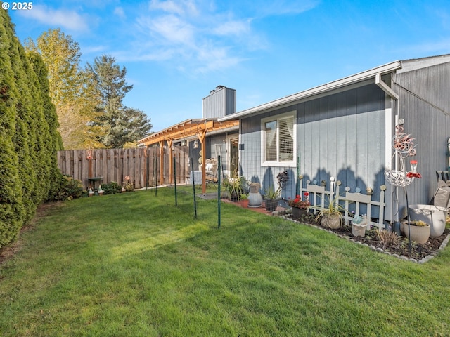 view of yard with fence