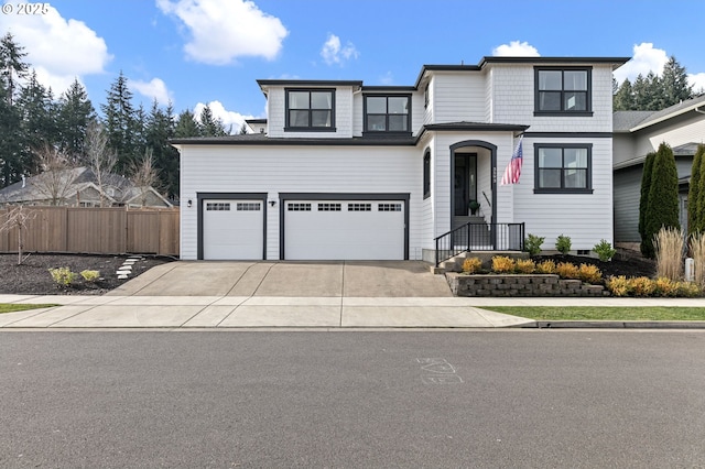 view of front of home with a garage