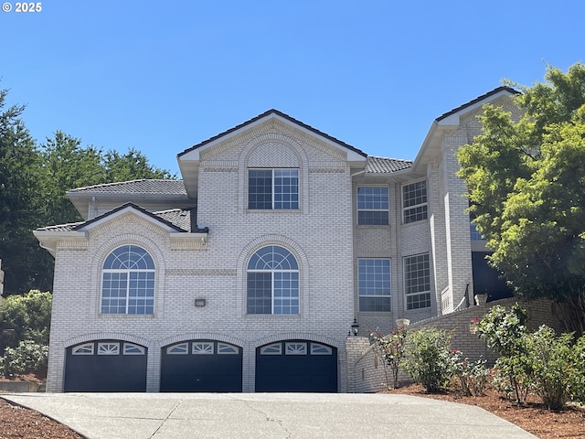 view of front of home with a garage