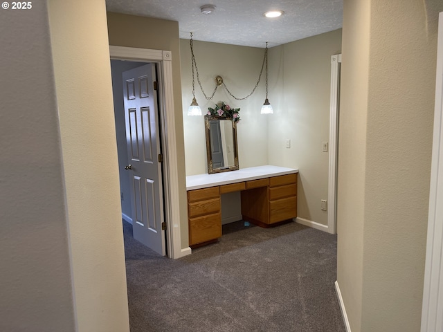 bathroom featuring vanity and a textured ceiling