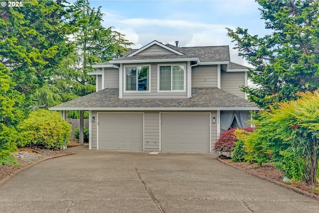 2038 Titan Ter, West Linn, OR 97068 - view of front of house featuring an attached garage, driveway, and a shingled roof