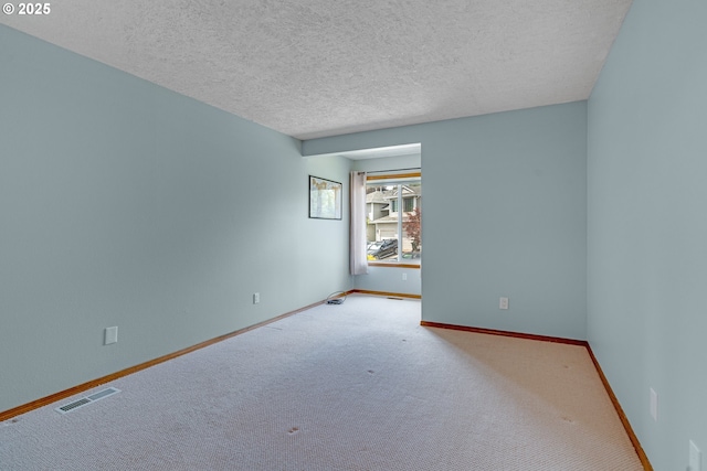 2038 Titan Ter, West Linn, OR 97068 - empty room featuring a textured ceiling and carpet floors