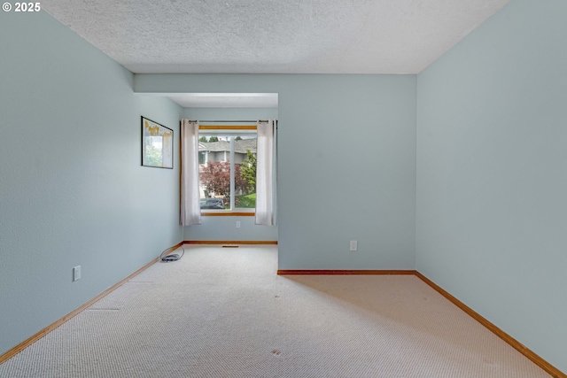 2038 Titan Ter, West Linn, OR 97068 - carpeted empty room with baseboards and a textured ceiling
